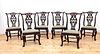 A set of six Georgian-style walnut dining chairs,