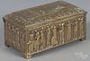 Brass dresser box, 19th c., with relief Roman scenes, 3'' h., 6 3/4'' w.