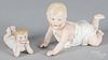 Three German bisque piano babies, 19th c., two Gebruder Heubach, 4 1/2'' l. and 5'' l.