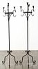 Pair of wrought iron torchiers, 20th c., 66'' h.