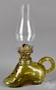 Miniature amber shoe finger oil lamp, patent date of 1868, 8 1/2'' h.