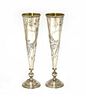 A pair of Russian silver spill vases,