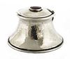 A silver-plated capstan inkwell,
