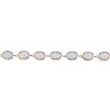 A synthetic opal line bracelet. Designed as a series of oval synthetic opal cabochons, each within a