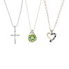A selection of three gold gem-set pendants. To include an 18ct gold cross with diamond highlight, a