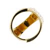 A 1970s 18ct gold textured dress ring. Of textured design, the overlapping panels, forming a central