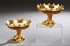 Pair of Danish Royal Copenhagen Neoclassical Porcelain Tazzas, 1870-1890, in matte and burnished gilt with a relief palmette rim, and a neoclassical f