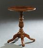 French Carved Walnut Pedestal Lamp Table, c. 1870, the circular stepped incise carved top on a turned and reeded urn support, on four cabriole legs, h