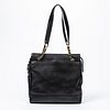 Chanel Triple CC Large Shopping Tote, in black caviar calf leather with interlaced chain handle and golden brass hardware, the zip closure opening to 