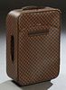 Louis Vuitton Pegase Front Logo 65 Suitcase, in Damier Ebene brown coated canvas with golden brass hardware, opening to a dark brown nylon lined inter