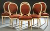 Set of Six French Louis XVI Style Carved Polychromed Beech Dining Chairs, the curved oval upholstered back over a bowed upholstered seat, on turned ta