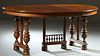 French Henri II Style Carved Mahogany Dining Table, c. 1880, the stepped rounded edge oval top on turned tapered trestle supports, joined by a spindle