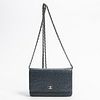Chanel Camellia Chain Wallet Shoulder Bag, in Cadeblue Camellia embossed calf leather and silver hardware, the snap closure opening to a periwinkle si