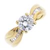 An 18ct gold diamond single-stone ring. The brilliant-cut diamond, to the tapered baguette-cut diamo