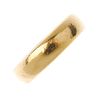 An early 20th century 22ct gold band ring. Hallmarks for Birmingham, 1905. Width 5mms. Weight 7.7gms
