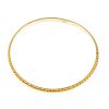 A 22ct gold bangle. Of spiral and bright-cut design. Hallmarks for London, 2007. Inner diameter 6.1c
