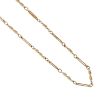 A 9ct gold fancy-link chain. Designed as a series of alternating trombone and twist links. Hallmarks