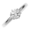 A platinum diamond single-stone ring. The brilliant-cut diamond, to the plain band. Diamond weight 0