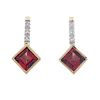 A pair of garnet and diamond ear pendants. Each designed as a kite-shaped garnet, suspended from sin