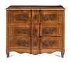 A Louis XV Provincial Walnut Serpentine-Front Commode