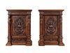 A Pair of Renaissance Revival Carved Walnut Marble-Top Cabinets