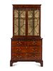 A George III Figured Walnut Bookcase-on-Chest