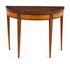 An Edwardian Painted Satinwood Flip-Top Game Table
