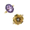 Two gem-set dress rings. To include a brilliant-cut diamond flower ring and an oval-shape amethyst s