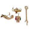 A selection of four 9ct gold charms. To include a spanner charm, a paste lantern charm, together wit