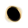 A gentleman's onyx signet ring. The oval onyx panel, to the tapered band. Weight 5.9gms. <br><br>Ove