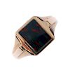 A gentleman's 1960s 9ct gold bloodstone signet ring. The rectangular-shape bloodstone, to the tapere