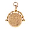 An early 20th century 9ct gold swivel fob. The scrolling foliate engraved front and plain reverse, t
