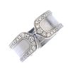 (539290-1-A) CARTIER - a 'C de Cartier' diamond ring. The textured torque band, with brilliant-cut d