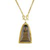 (540443-2-A) Two pendants and necklaces. Each designed as a religious figure, encased within a plast