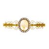 (540912-2-A) An early 20th century 15ct gold agate and split pearl brooch. The oval agate cabochon,