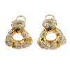 (117589) A pair of diamond ear pendants. Each designed as brilliant-cut diamonds within an open-work