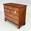 George II style burlwood chest of drawers