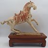 Tang Style Horse on a Hardwood Stand.