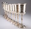 A SET OF EIGHT SILVER-PLATED GOBLETS, each campana bowl par