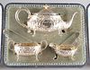 A VICTORIAN SILVER THREE-PIECE TEA SERVICE, by Horace Woodw