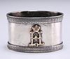 A RUSSIAN SILVER NAPKIN RING, oval, gold mounted with initi