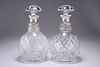 A PAIR OF ELIZABETH II SILVER-COLLARED DECANTERS, by Robert