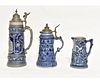 Two German Stoneware Steins and Pitcher