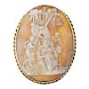 A cameo brooch. Of oval outline, the shell cameo carved to depict Christ's crucifixion, to the rope-
