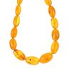 A natural amber necklace. Comprising forty-two graduated beads measuring 1.4 to 2.8cms. Length 80cms