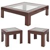Lote de 3 mesas. SXX. Elaboradas en madera. Con cubiertas de cristal. Consta de: par de mesas auxiliares y mesa de centro.