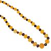 A selection of amber and modified amber jewellery. To include an alternating bi-colour amber bead ne