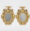 Pair of American Carved Giltwood Oval Mirrors, 19th Century