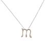 TIFFANY & CO. - an Elsa Peretti initial pendant. Designed as the letter 'M', suspended from a trace-