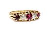 An 18ct gold red spinel, ruby and diamond boat shaped ring, c.1900,